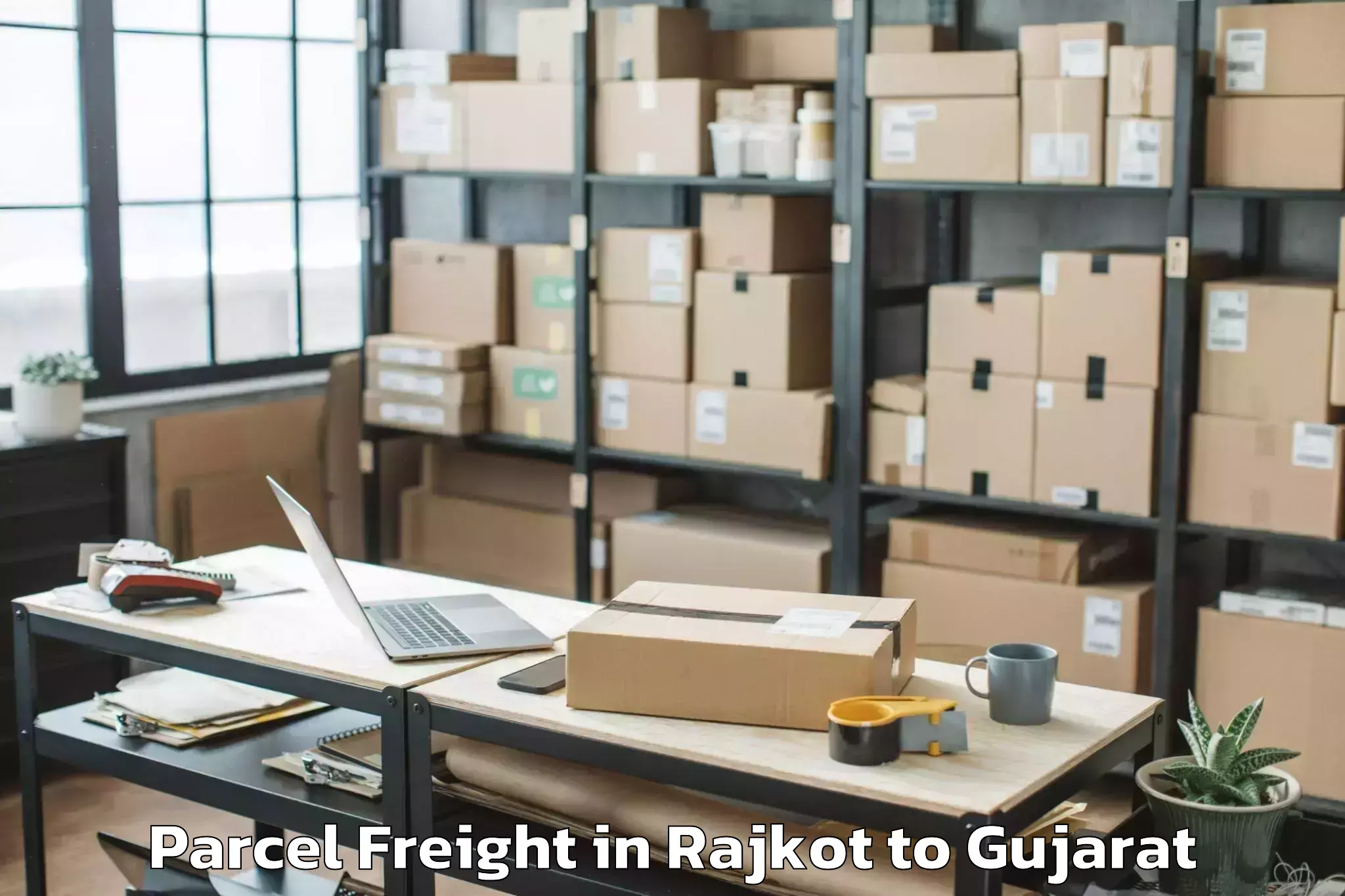 Book Your Rajkot to Kheralu Parcel Freight Today